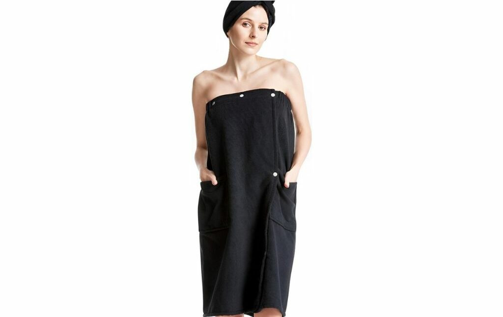 Woman wearing a Bath Wrap and Hair Towel with buttons.