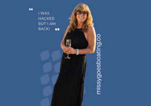 Woman in black dress holding champagne