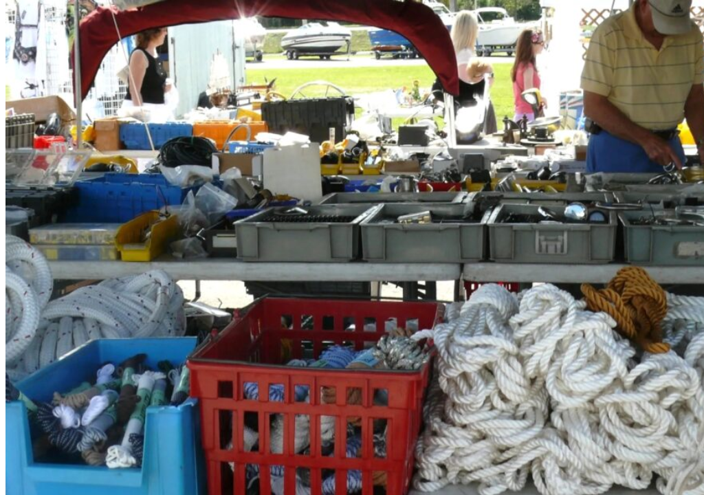Swap meet tables filled with various items